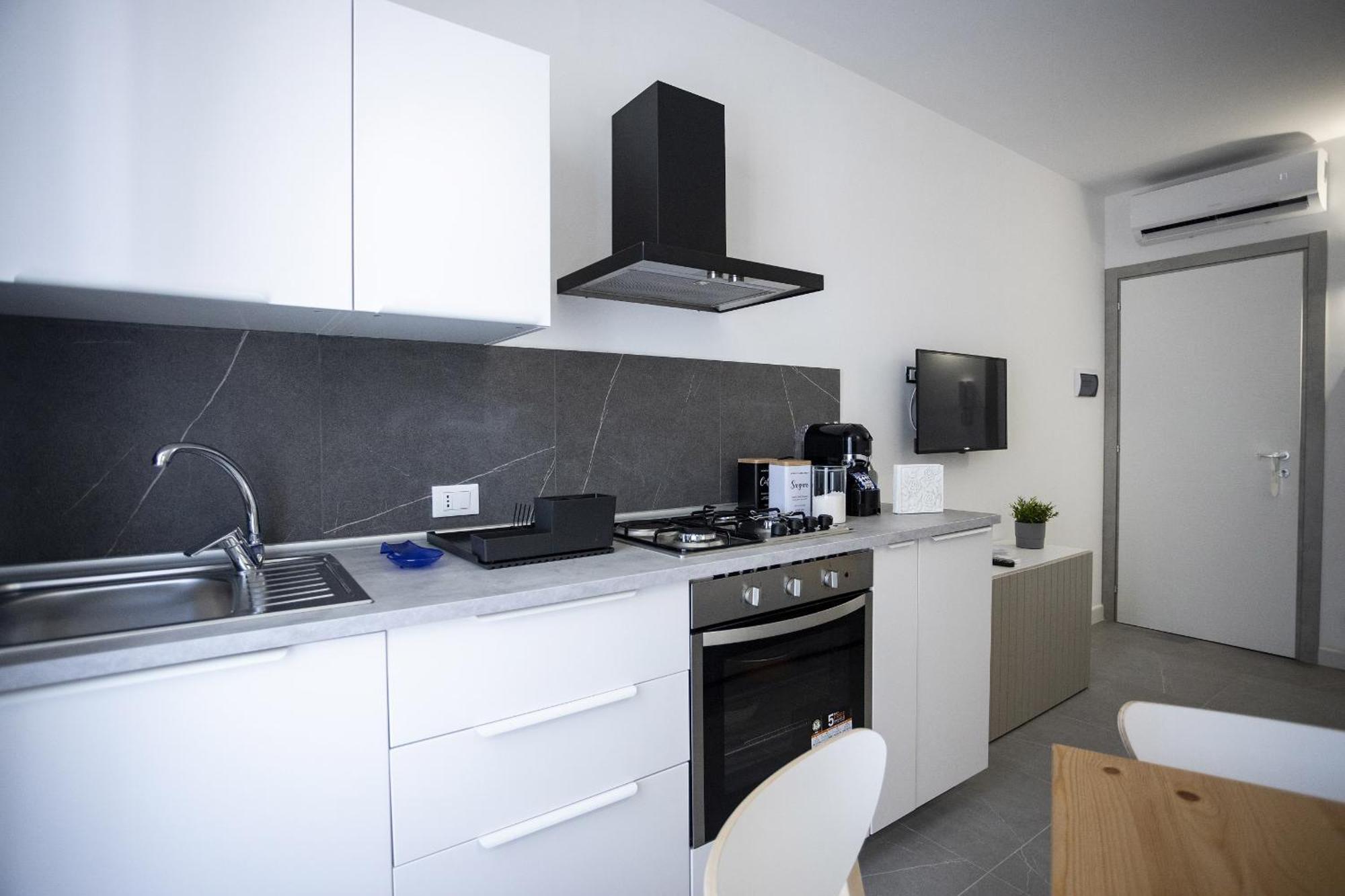 Acquaro Suite Apartments Σαν Βίτο λο Κάπο Δωμάτιο φωτογραφία